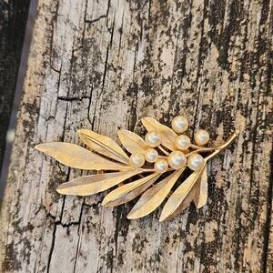 Vintage Crown Tifari golden leaf brooch with faux pearls. 3" length